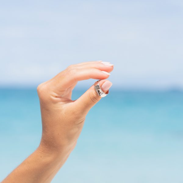 sterling silver imperfect world ring by the ocean
