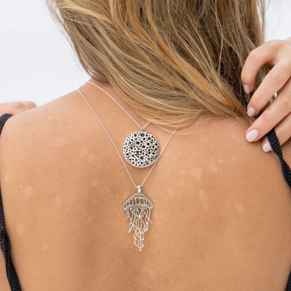 sexy girl wearing sterling silver handmade pendants
