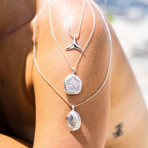 Sexy girl styling silver ocean inspired pendants