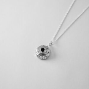 Silver small urchin pendant resembling a sea urchin