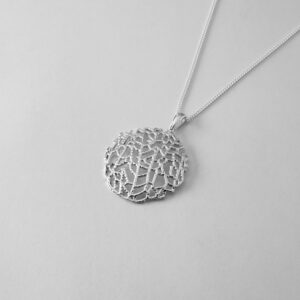 Delicate silver Venus Sea Fan Coral pendant necklace.