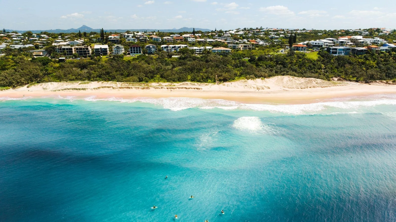 Aerial view of Caloundra's golden beach and the Pacific Ocean on the Sunshine Coast